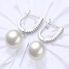 Load image into Gallery viewer, White Swarovski Elements Thin Dangling Freshwater Pearl Clip On Earrings in 14K White Gold Plating