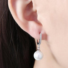 Load image into Gallery viewer, White Swarovski Elements Thin Dangling Freshwater Pearl Clip On Earrings in 14K White Gold Plating
